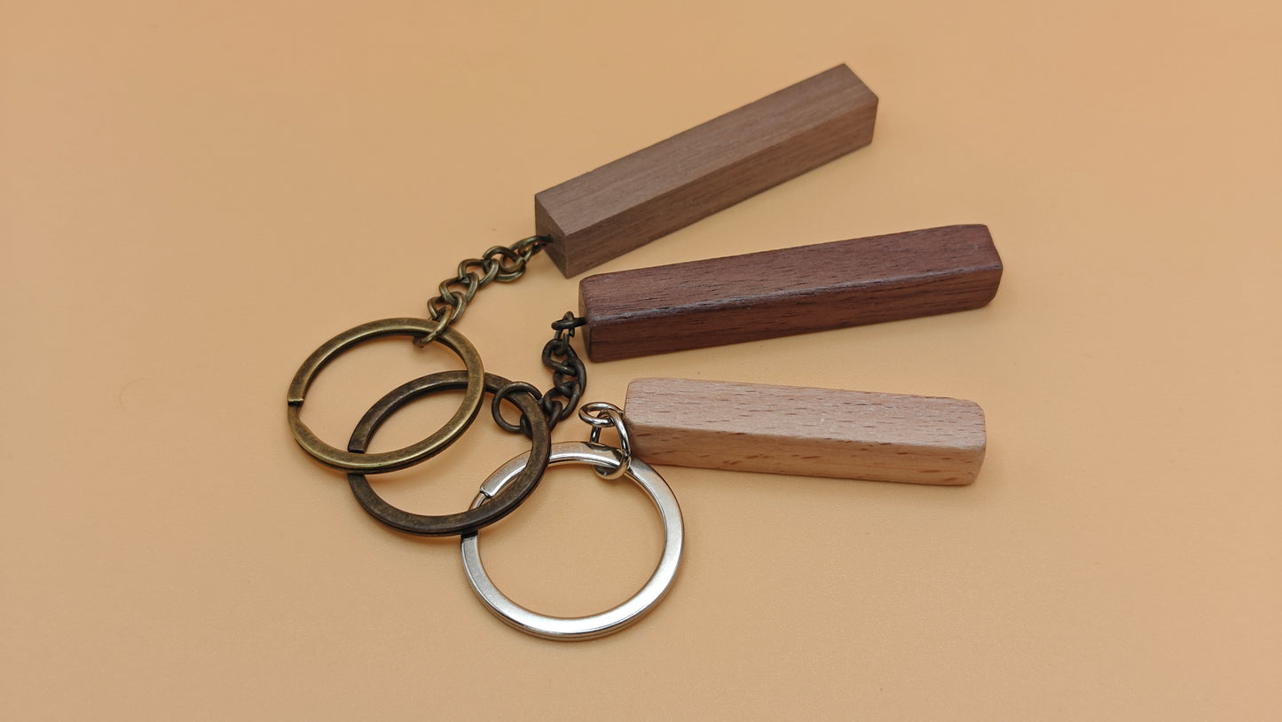 Stijlvolle houten sleutelhanger – personaliseerbaar in 3 houtsoorten